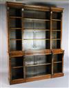 A Victorian figured walnut inverse breakfront library bookcase, W.6ft 1in. D.1ft 4in. H.7ft 6in.                                       