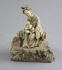A Chinese soapstone group of Guanyin and child, probably Kangxi period, 15 cm high                                                                                                                                          