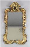 A George II carved and gilt frame looking glass, W.2ft 1.5in. H.3ft 5.5in.                                                             