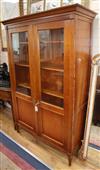 A pair of French federal-style cherrywood glazed bookcases W.122cm                                                                     