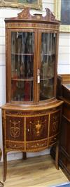 A 19th century Sheraton design marquetry inlaid mahogany bowfront corner display cabinet W.74cm                                        