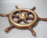 A hardwood and brass mounted Ship's wheel, signed Lawrence Simpson 50cm                                                                                                                                                     