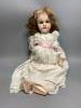 A French Mon Cheri doll, with jointed body, height 20 inches, 51cm                                                                                                                                                          