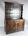 A George III oak dresser, W.4ft 7in. H.6ft 6in.                                                                                        