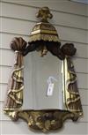 An Italian walnut and parcel gilt mirror W.47cm                                                                                        