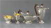 A George VI Art Deco silver four piece pedestal tea set by Adie Brothers, gross 55 oz.                                                 