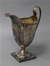 A George III silver helmet-shaped cream jug,                                                                                           