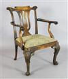 A George II red walnut elbow chair,                                                                                                    