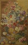 A needlework panel depicting flowers in an urn upon a ledge, worked by Alan Ely, 1939-40 at Bridport, overall 36 x 26in.               