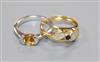 A modern 18ct white gold and citrine ring and an Italian 18ct gold ring.                                                               