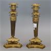 A pair of ormolu Empire style candlesticks height 27cm                                                                                 
