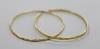 Two Middle Eastern yellow metal bangles (one cut)                                                                                                                                                                           