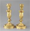 A pair of mid 19th century French ormolu candlesticks, height 8.25in.                                                                  