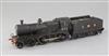 A CCW 4-4-0 (2P) LMS locomotive and tender, number 671, black livery, 3 rail with skate, overall 38cm                                  