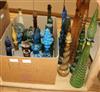 An extensive collection of 1950's coloured glass decanters                                                                             