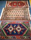 A Bokhara style mat and two others 116 x 66cm, 130 x 81cm and 125 x 65cm                                                               