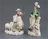 A pair of Rockingham porcelain groups of a shepherd and shepherdess, c.1830, h. 21.5 and 18cm, some faults                             