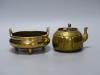 A Chinese bronze censor with Xuande mark, diameter 15cm, and a brass tea pot                                                                                                                                                