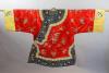 A Chinese red silk robe, early 20th century                                                                                                                                                                                 