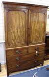 A Regency mahogany linen press fitted three sliding trays W.124cm                                                                      