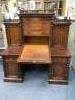 A late Victorian mahogany kneehole desk with fall front, width 151cm, depth 74cm, height 174cm                                                                                                                              