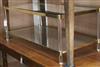 A gilt metal glass and lucite two tier coffee table W.111cm                                                                            