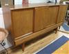 A 1960's Danish teak sideboard W.200cm.                                                                                                