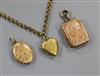 Three engraved 9ct gold lockets and a gilt metal chain.                                                                                