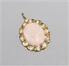 A modern yellow metal, white opal and diamond cluster set oval pendant, 2cm.                                                           