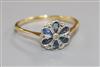 An 18ct gold and platinum, sapphire and diamond cluster flower head ring, size Q.                                                      