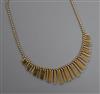 A 1980's Italian Uno-a-Erre 9ct gold fringe necklace, 14 grams.                                                                        