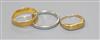 A 22ct. gold band, a platinum band and a yellow metal band.                                                                            