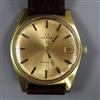 A gentleman's early 1970's gold plated and steel Omega manual wind wrist watch with date aperture, movement c.613.                     