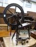 A reproduction spinning wheel, height 90cm                                                                                                                                                                                  