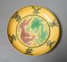 A Chinese yellow ground green and aubergine enamelled 'dragon' dish, Guangxu mark and possibly of the period, D.11cm                                                                                                        