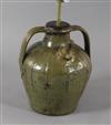 A French medieval green glazed jar, 13in.                                                                                              