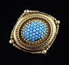 A Victorian gold and turquoise set oval pendant brooch with glazed back, 40mm.                                                         