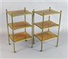 A pair of early 20th century tubular brass and walnut three tier etageres, W.1ft 3in. D.1ft 1in. H.2ft 4in.                            