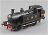 A scratch built Jinty class O gauge 0-6-0 LMS tank engine, black livery, number 7301, 3 rail, 22cm                                     