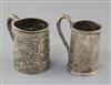 A late 19th/early 20th century Chinese repousse silver christening mug by Wang Hing, Hong Kong, and 1 other.                           