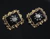 A pair of Victorian gold, rose cut diamond and black onyx brooches, 25mm.                                                              