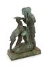 Ferdinand Victor Blundstone (1882-1951). An early 20th century bronze group of a woman and nymph feeding a doe, width 60cm depth 26cm height 87cm                                                                           