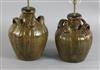 Two similar 17th century French, Auvergne, terracotta spouted jars, 14in. and 15.5in.                                                  