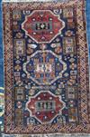 A Shirvan blue ground rug, 9ft 3in by 6ft 4in.                                                                                         