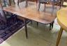 A Regency mahogany drop leaf dining table, 146cm extended, depth 106cm, height 70cm and six Regency provincial mahogany dining chairs, one with arms                                                                        