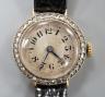 A lady's early 20th century 18k and diamond set manual wind wrist watch, on later leather strap                                                                                                                             