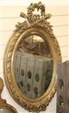 A Louis XVI style gilt oval mirror W.57cm                                                                                              