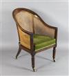 A Regency mahogany bergere library chair, W.1ft 11in. D.2ft 4in. H.3ft                                                                 