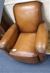 A pair of leather club armchairs                                                                                                       