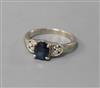 A 14ct white gold, sapphire and diamond ring, size H.                                                                                  